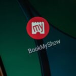 BookMyShow app interface showing movie ticket booking screen
