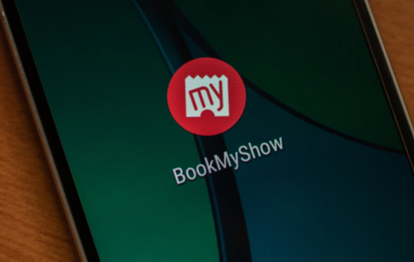 BookMyShow app interface showing movie ticket booking screen